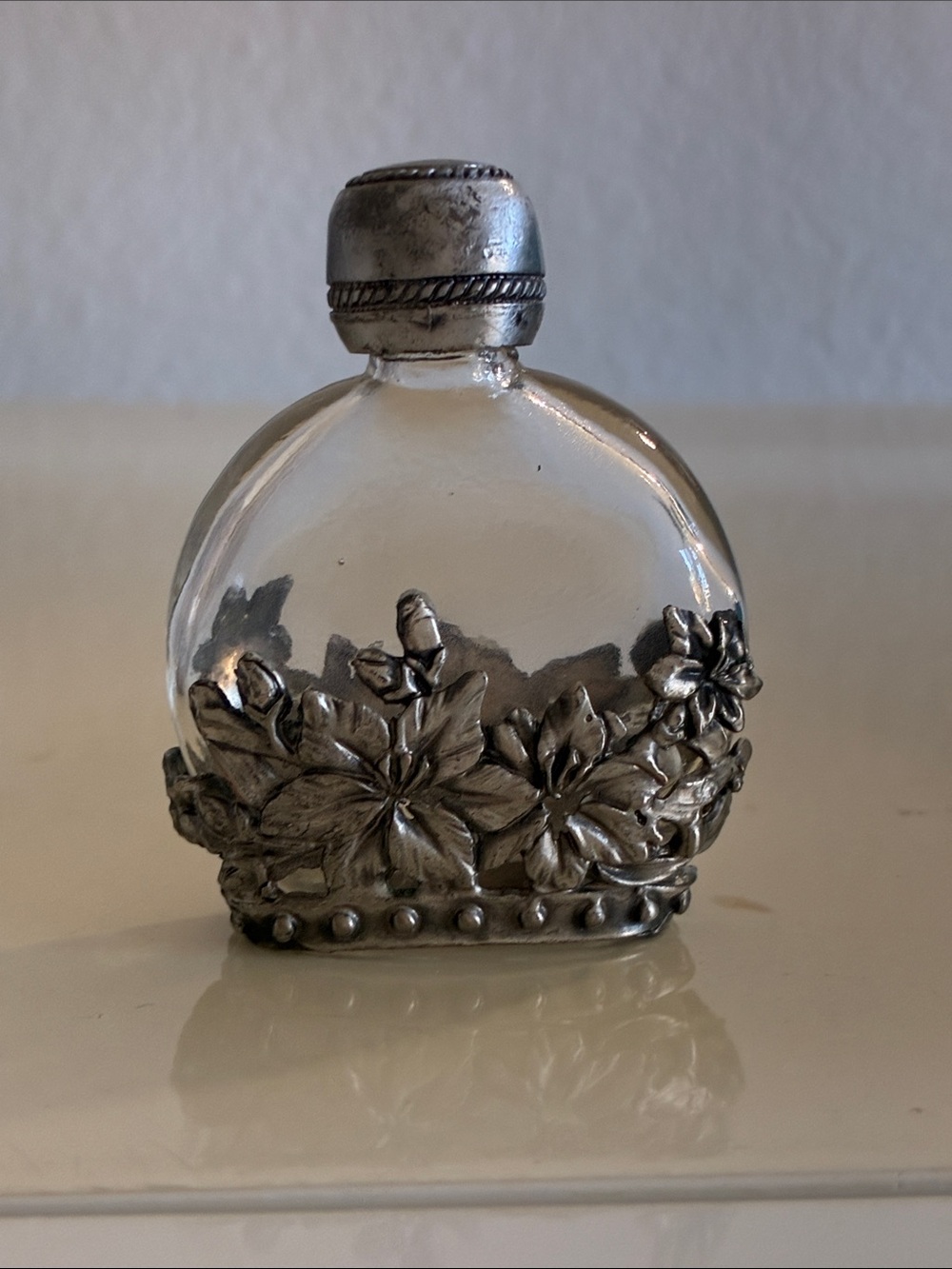 Clear Glass and Silver Floral Perfume Bottle